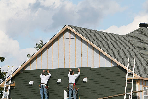 Professional Siding technician working in Charlestown, MD